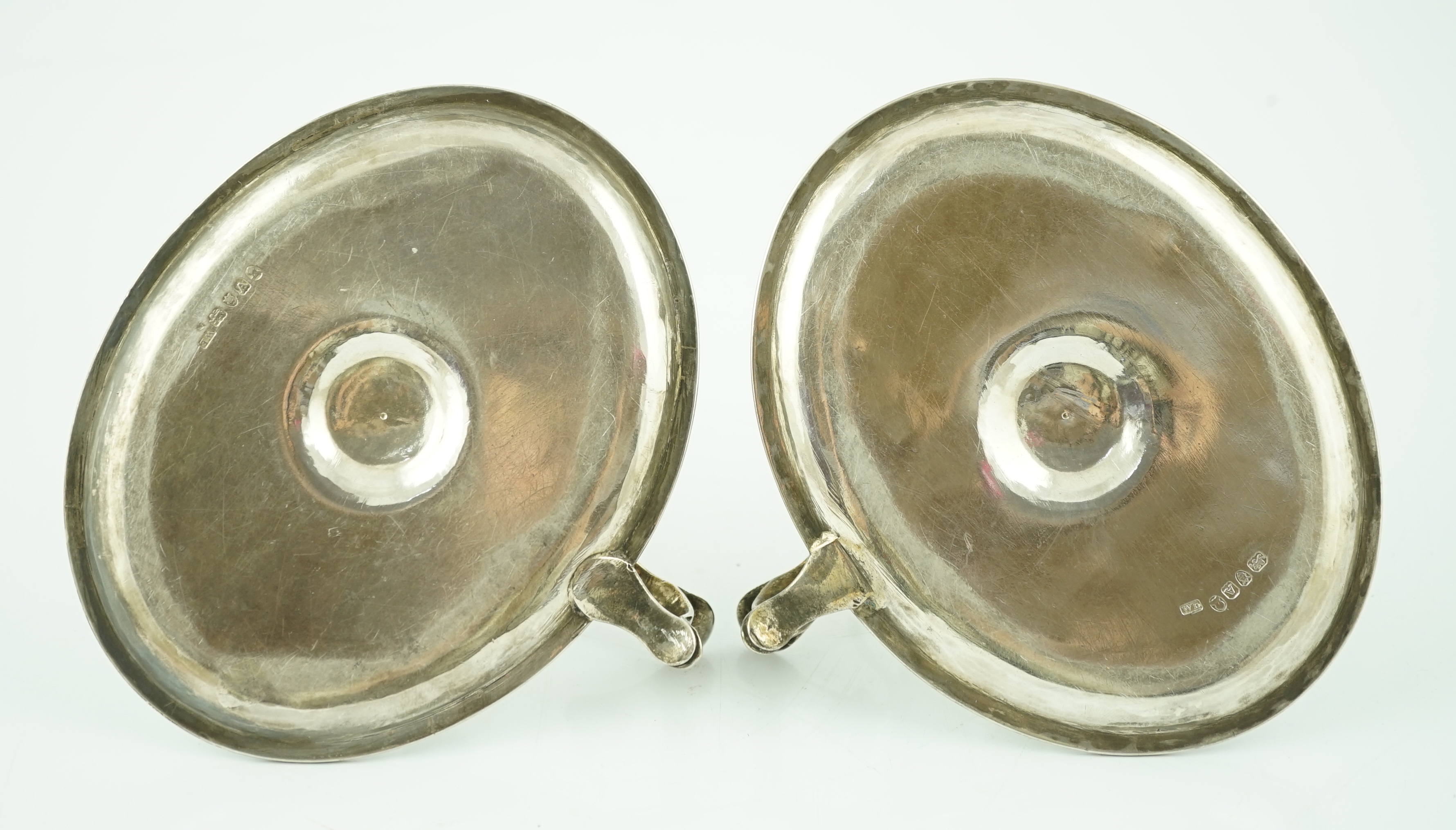 A pair of George III silver chambersticks, by Walter Brind